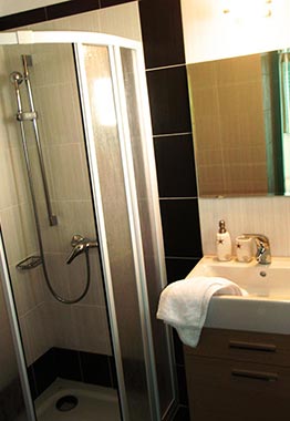 Spacious bathroom in a room of Kampos Home in Sifnos